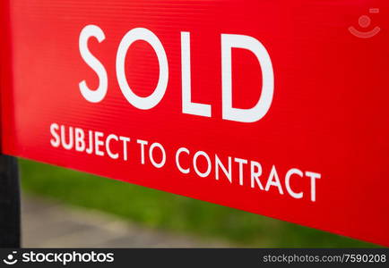 Close up Sold Subject to Contract Real Estate Agent Sign or Board