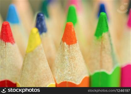 close up stack of colored pencils background.