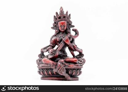 Close up statue of goddess Saraswati with musical instrument isolated. Close up statue of goddess Saraswati with musical instrument