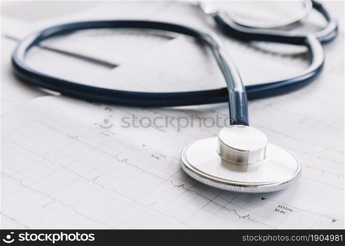 close up stethoscope cardiogram chart. Beautiful photo. close up stethoscope cardiogram chart