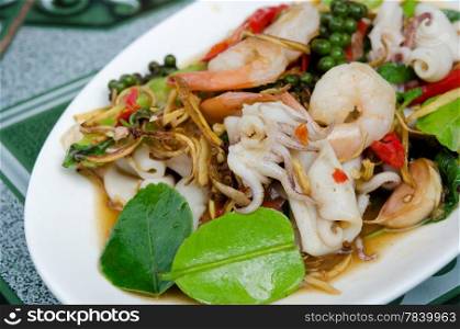 close up stir fried squid and shrimp with mix herbs
