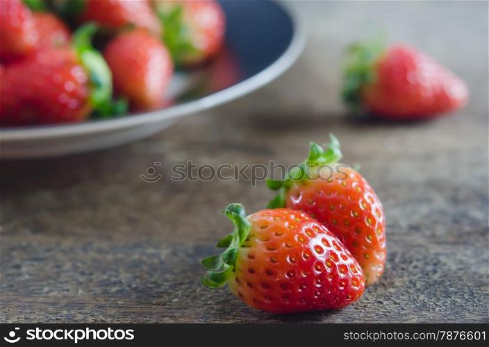close up strawberry. close up fresh red strawberries over wooden background