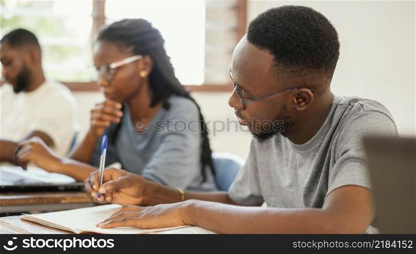 close up students studying together