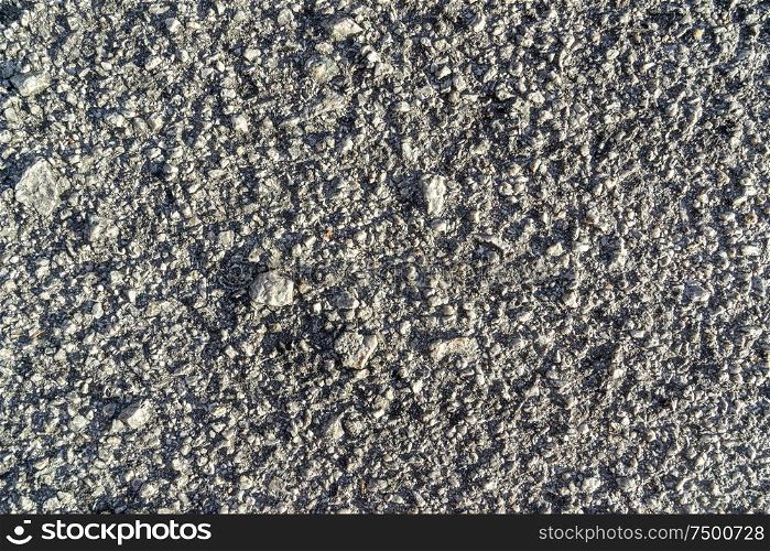 close up surface rough of asphalt, Seamless grey road with small rock, Texture Background.