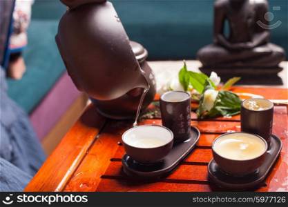 Close-up table with earthenware for Chinese tea ceremony. Chinese tea ceremony
