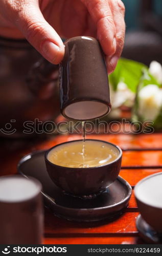 Close-up table with earthenware for Chinese tea ceremony. Chinese tea ceremony