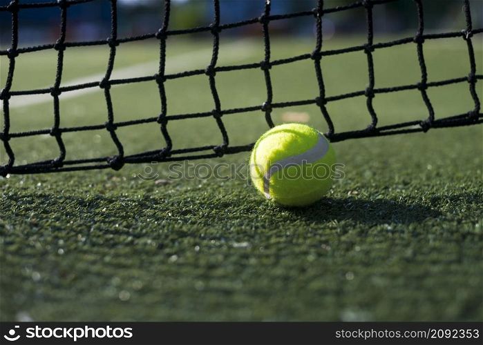 close up tennis ball ground