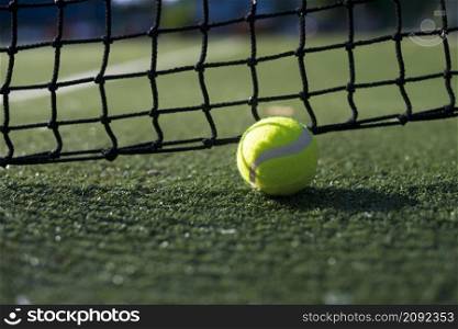 close up tennis ball ground