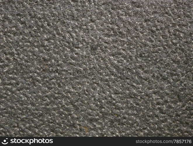 Close up - texture of rough stone plate, copy space