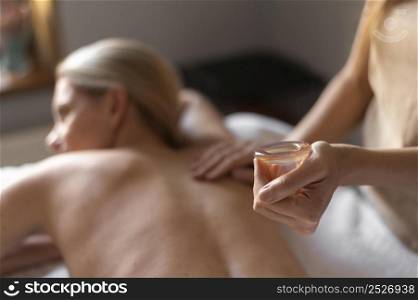 close up therapist massaging woman