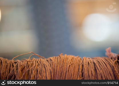 Close up thread linen fabric on Bokeh Light background with copy space