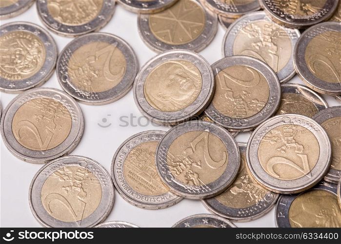 Close up top view image of large amount of Euro money coins.