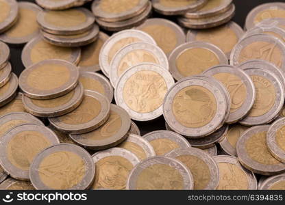 Close up top view image of large amount of Euro money coins.