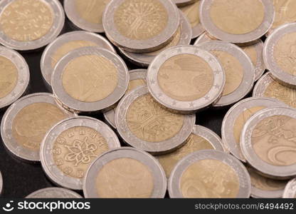 Close up top view image of large amount of Euro money coins.. euro coins