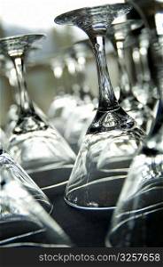Close-up up of many martini glasses.