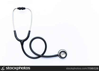 Close up view of black stethoscope on white back
