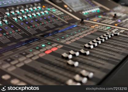 Close up view of digital audio mixing console. Selective focus.