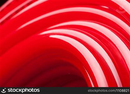 Close-up view of long red water pipe