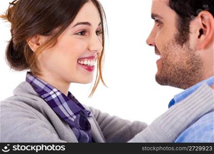 Close up view of loving couple looking at each other against white background