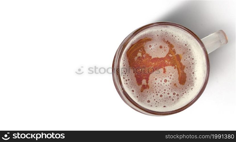 Close up view of mug beer with bubble on glass isolated on white background. top view. celebration concept.