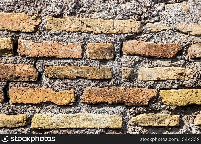 Close up view of old brick wall in a background