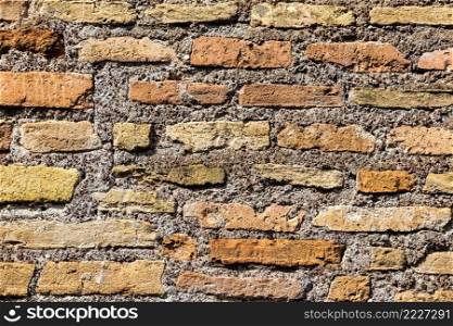 Close up view of old brick wall in a background