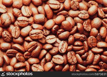 Close up view of roasted coffee beans. Coffee beans background