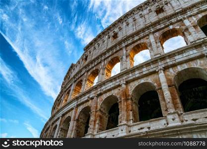 Close up view of Rome Colosseum in Rome , Italy . The Colosseum was built in the time of Ancient Rome in the city center. It is one of Rome most popular tourist attractions in Italy .