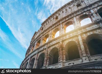Close up view of Rome Colosseum in Rome , Italy . The Colosseum was built in the time of Ancient Rome in the city center. It is one of Rome most popular tourist attractions in Italy .
