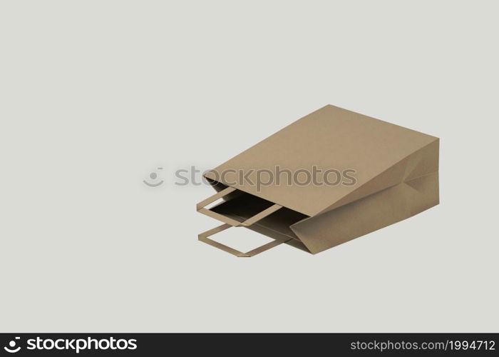 Close up view of Shopping bag from craft paper with handles on white background , 3d Rendering isolated illustration. suitable for your element design.