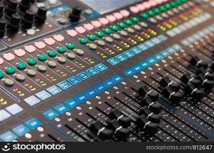 Close up view of sound mixing console. Selective focus.