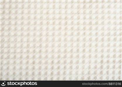 close up view of textured cotton fabric. unbleached linen textile, square pattern . close up view of textured cotton fabric. unbleached linen textile, square pattern. 
