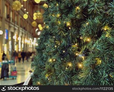 close-up view of the decorative LED lights of a large Christmas tree. Holidays and Christmas celebrations. Winter traditions