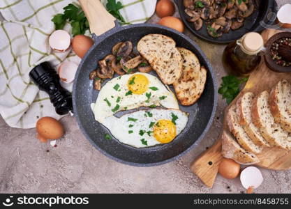 Close up view of the fried egg on a frying pan.. Close up view of the fried egg on a frying pan