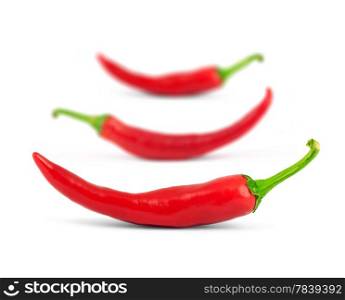 Close-up view of the red peppers isolated on a white background&#xA;