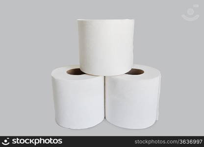 Close-up view of toilet paper stack on white background