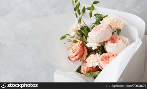 Close up view of white and pink flowers bouquet for the wedding ceremony. Bouquet of beautiful flowers