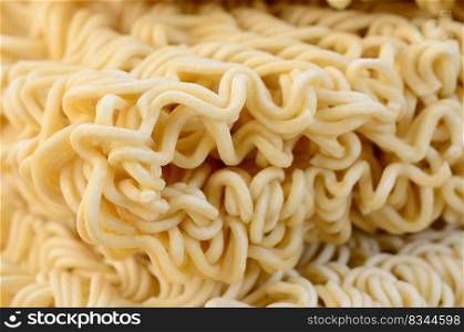 Close up view of yellow dry instant noodles. Chinese traditional food