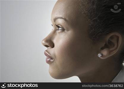 Close-up view of young woman, profile
