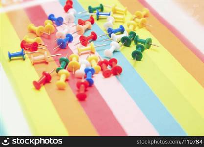 Close-up view on a multicolored set of pushpins