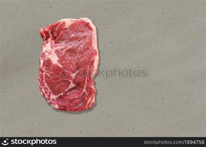 Close up view red fresh rib eye on kitchen table. isolated on white background.
