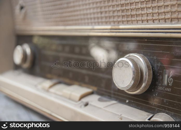 Close up volume of old radio