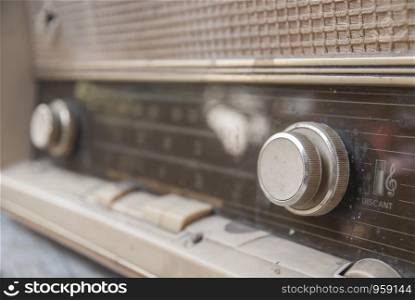 Close up volume of old radio
