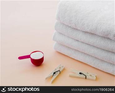 close up white folded clean towels with clothes pin. High resolution photo. close up white folded clean towels with clothes pin. High quality photo