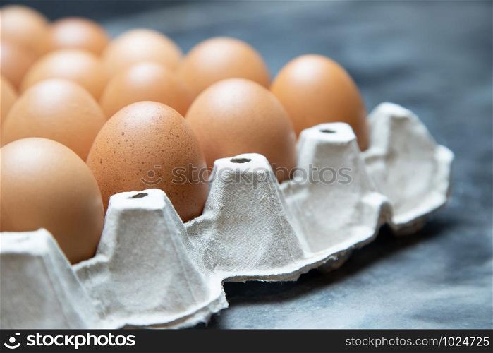 close up whole eggs in box. Chicken egg many. soft focus.