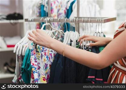 close up woman checking clothes