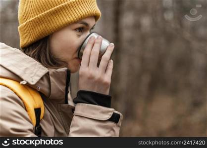 close up woman drinking coffee