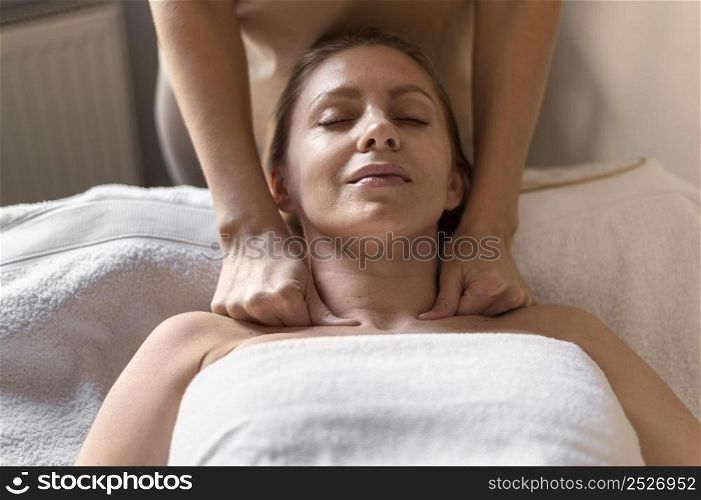 close up woman experiencing massage