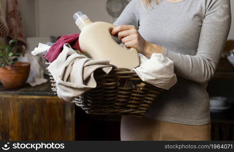 close up woman holding laundry basket. High resolution photo. close up woman holding laundry basket. High quality photo