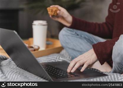 close up woman holding muffin